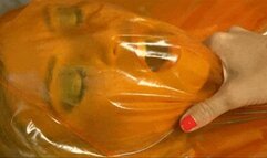 Lustful orange plastic fetish lover slut
