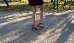 girl in high-heeled sandals severely twisted her leg and could not stand such painO