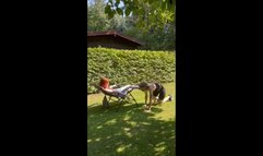 Submissive slave girl publicly worships the feet of the Goddess