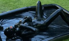 Messy latex encasement girl and the heavy rubber sploshing outdoor session - Part 1 of 2