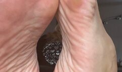 Rubbing my splendid oily soles, teasing with my high arches and wrinkled soles