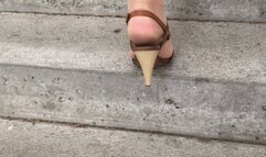 Nylons and heels walking up the stairs