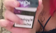 Smoking girl play with hellium balloons