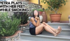 Petra plays with her feet while smoking - FULL HD