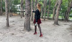 girl in black stockings and high-heeled sandals plays with the sandals and suddenly her heel opens, she continues to play with her feet and shoes