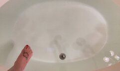 Gold bikini, gold ball gag, and magical fingers!