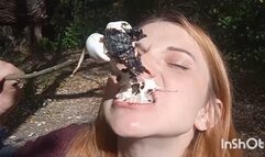 Eating food cooked over a fire in the forest