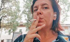 Smoking in a public park sexy Italian stepmother