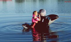 Alla has a hot ride on a shiny inflatable whale on the lake and inflates a beach ball with her mouth and plays with it at the same time!!!