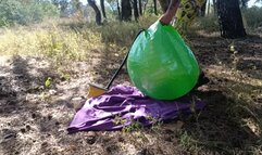 blow with feet pump gymball in forest