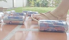 Katherine crushing cans under her sexy flat sandals