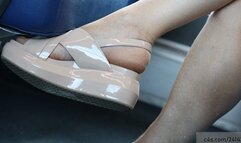 Beauty woman feet close-up, nice heels and wedge sandals heels