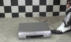 VCR Player under Cowgirl Boots