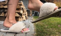 Fluffy slippers dangle