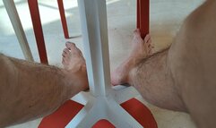 Long and skinny feet footplaying at the mall