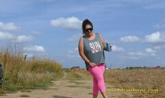 Fat brunette with sunglasses pee in her tights on a dirt road and then she pee on the concrete in front of a house