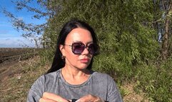 LORY smokes a thin cigarette a