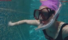 Alla swims in the pool and wears a diving mask and a breathing snorkel!!!