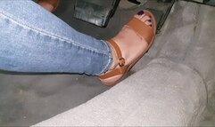 Brown sandals driving