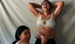 Tickle and massage in Gloria's navel