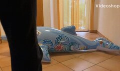 2 girls vs inflatable dolphin