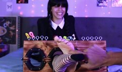 Wednesday Tries the Stocks