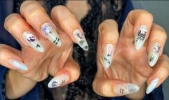 Halloween nail decor on elegant fingers