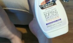 Getting all messy rubbing tonnes of lotion on my feet