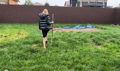 city girl in high heels was brought to the village and work in the garden