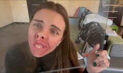 Face smeared against the glass