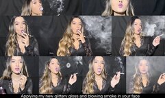 Applying my new glittery lipgloss, smoking 100s and blowing smoke in your face!