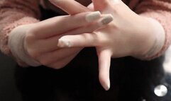 Shiny Surgical Gloves and Manicured Nails