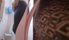 Peeing in a cold bathroom in a bar in Milan