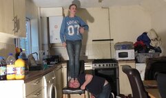 Head Trampled Under Bare Feet On The Chair (4K)