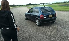 Miaisbeth cranking and starting her Chevy Corsa