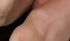 A nylon handjob and footjob from Macy Kiss