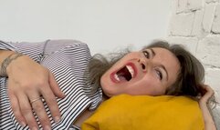 Charmy lies on the sofa