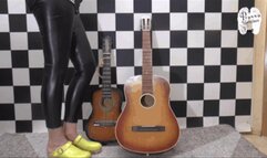 Two Guitars under wooden Clogs