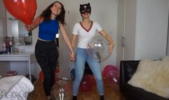 Saskia and Foxy team sit popping Ballon Ace