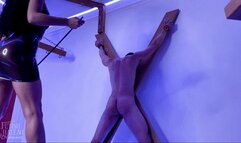 Evilwoman punishing slave in latex dress