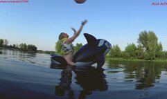 Alla is riding hot on a big inflatable whale on the lake and playing with a beach ball!!!