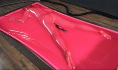 Ass up with orgasms and vibro in latex pink vacuum bed