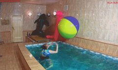 Alla plays in the pool with a large beach ball and blows it away!!!