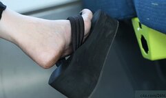 Candid dirty feet with platform sandals heeled