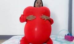 Sexy Camylle Stuffs Her Red Jumper With Baloon Boobs And Belly Then Pops Them