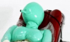 Rubber re-breather slut and her orgsasmus in green latex catsuit - Part 2 of 3 - Breath game with the inflatable mask