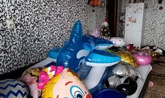 riding on whale in pool