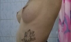 Carina sniffs her armpits