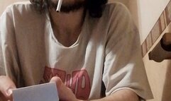 Smoking a 100's Red in the bathroom just woken up