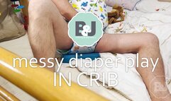 Messy diaper playing in crib